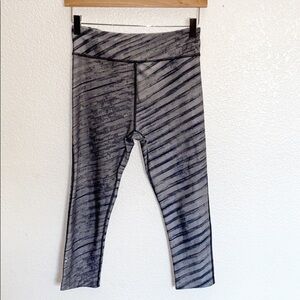 28. Under Armour Gray Black Striped Cropped Leggings